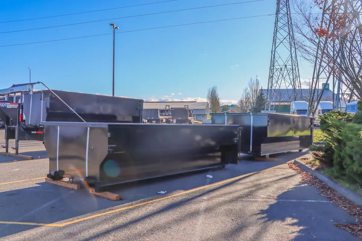 Roll-off dumpster ready for waste disposal at job site for Demolition Dumpster Rental in Maitland